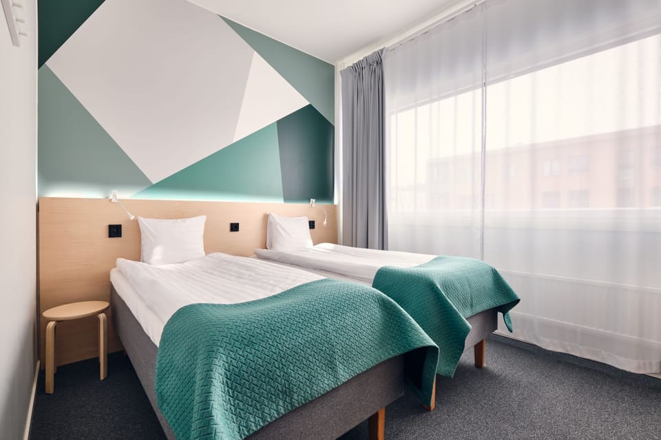 Standard Room | Desk, blackout drapes, iron/ironing board, free WiFi
