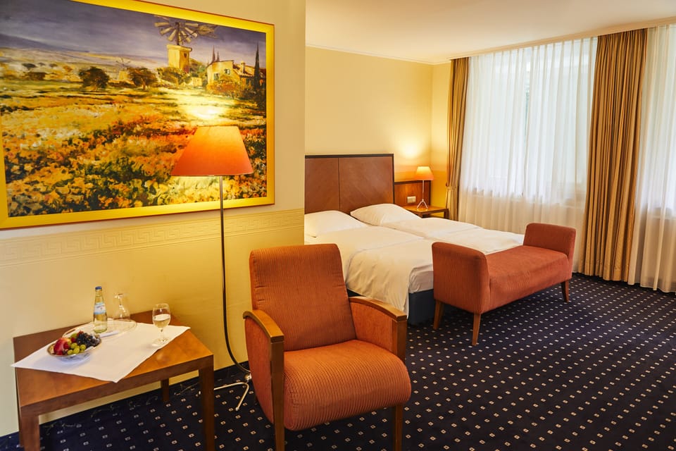Hypo-allergenic bedding, in-room safe, desk, laptop workspace