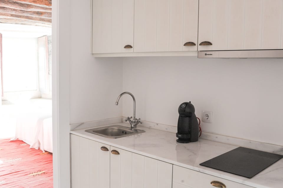 Deluxe Room | Private kitchenette | Fridge, microwave, stovetop, coffee/tea maker