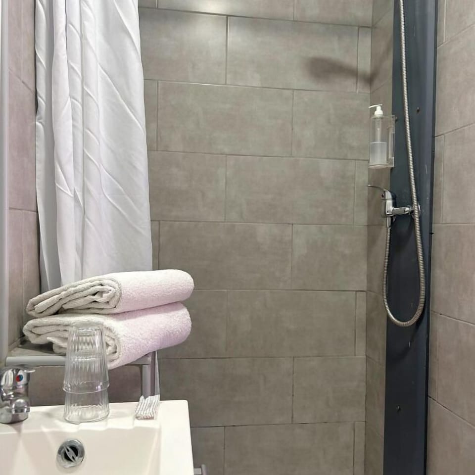 Shower, free toiletries, hair dryer, towels