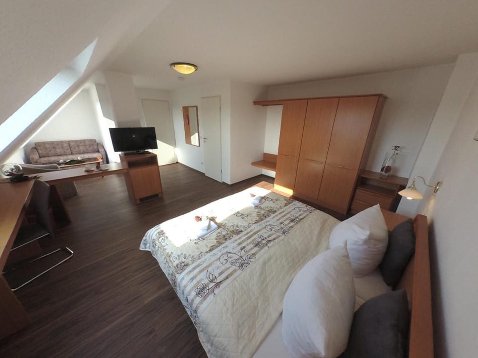 Double or Twin Room | Desk, laptop workspace, blackout drapes, rollaway beds