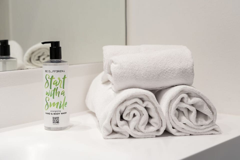 Shower, rainfall showerhead, free toiletries, hair dryer