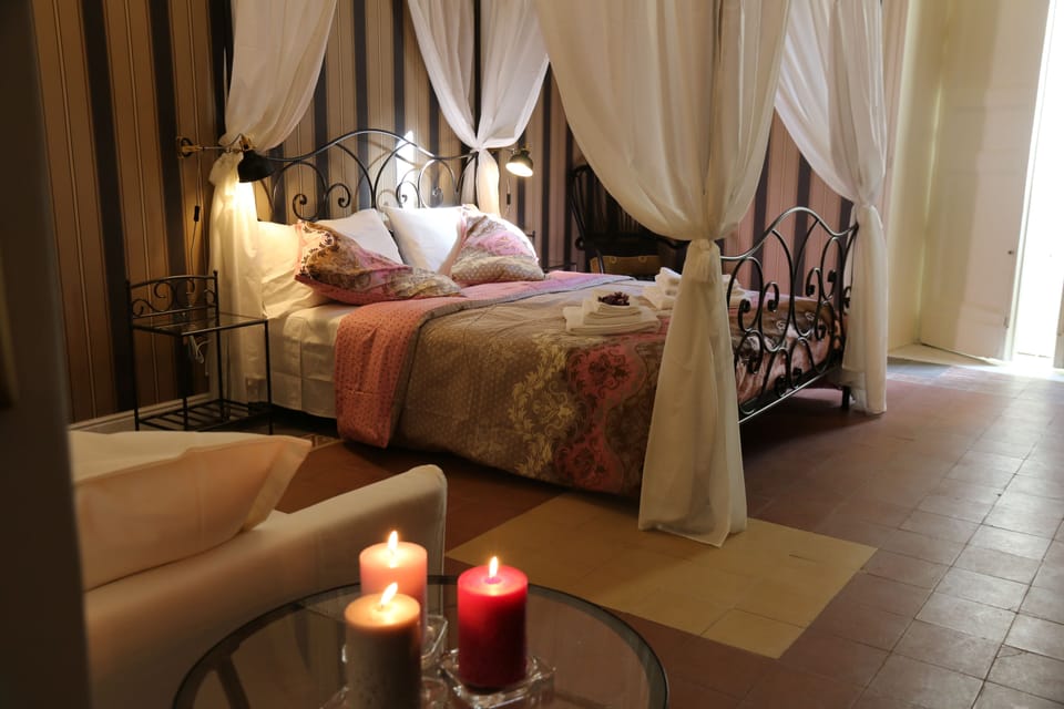 Deluxe Quadruple Room | Down comforters, free minibar items, in-room safe