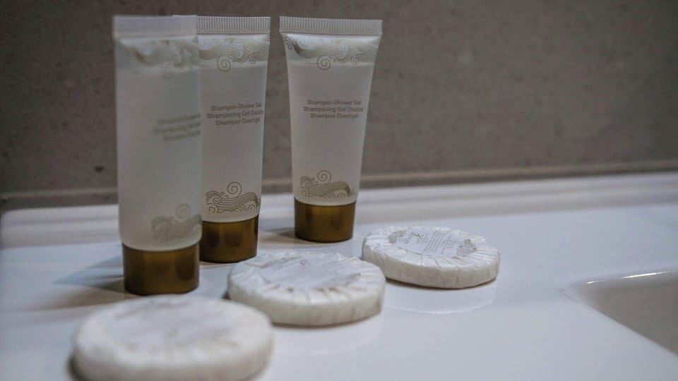 Rainfall showerhead, free toiletries, hair dryer, towels