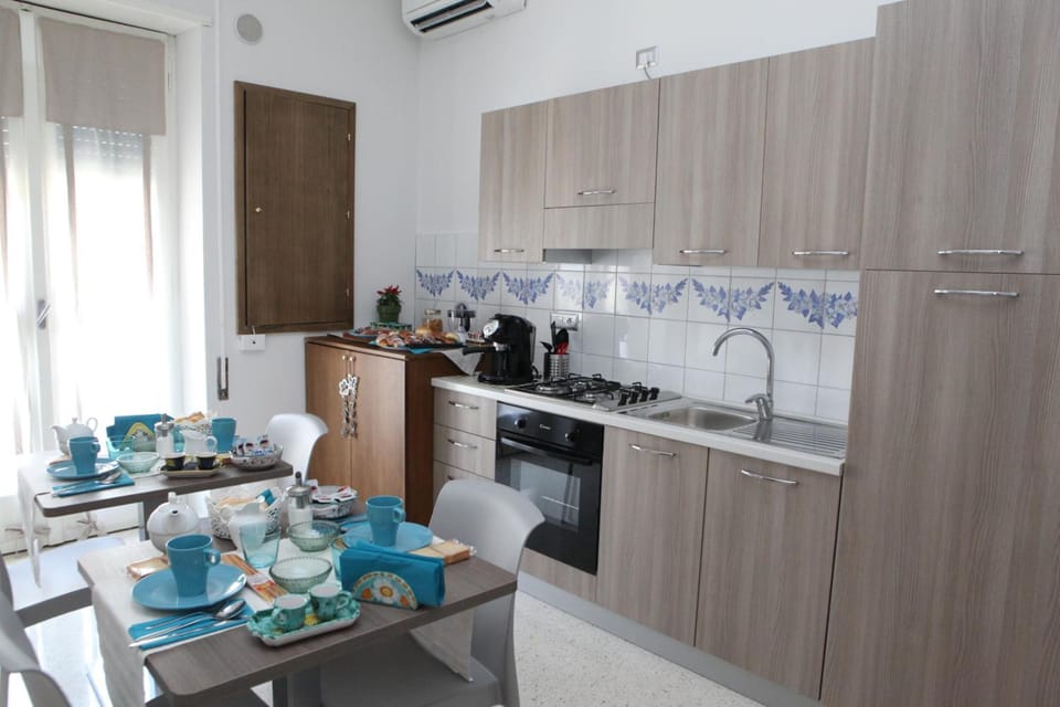 Full-size fridge, microwave, oven, espresso maker