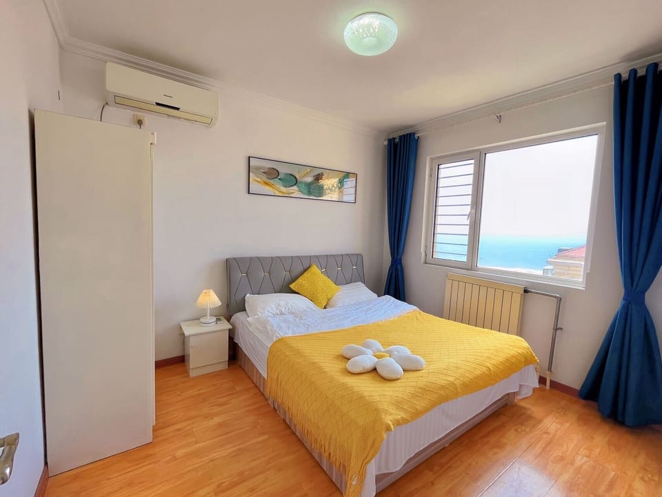 Two-Bedrooms Apartment | Living area | Flat-screen TV