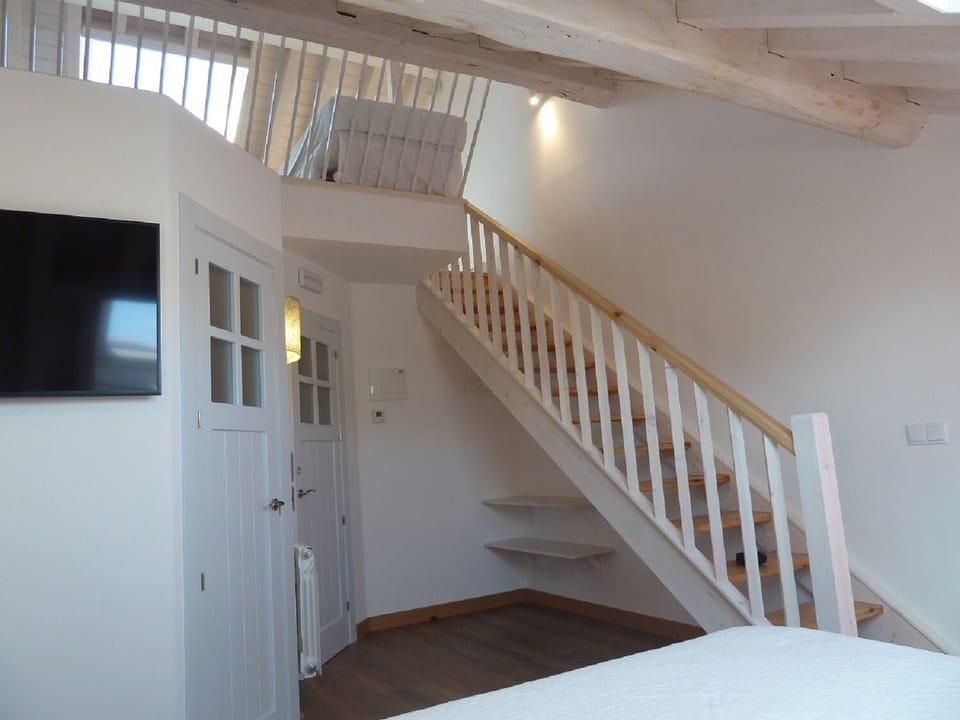 Family Room | Down comforters, individually decorated, individually furnished, desk