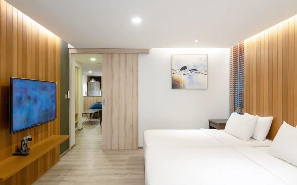 2 Bedroom Family Suite | Minibar, in-room safe, desk, laptop workspace