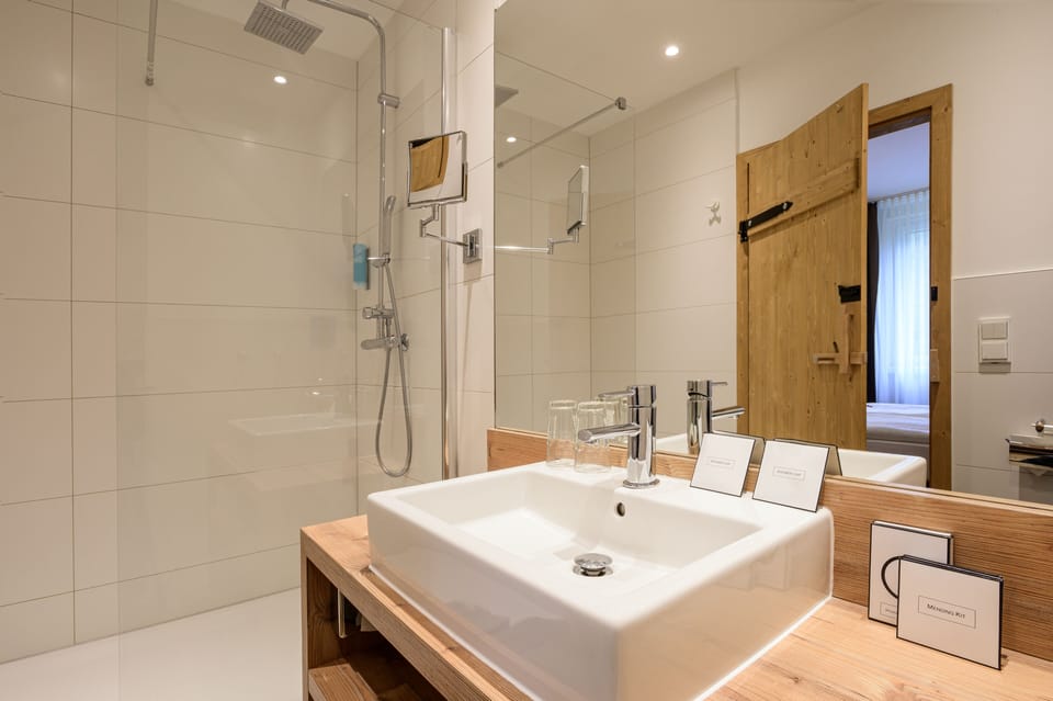Suite, 2 Bedrooms, Garden Area | Bathroom | Shower, free toiletries, hair dryer, towels