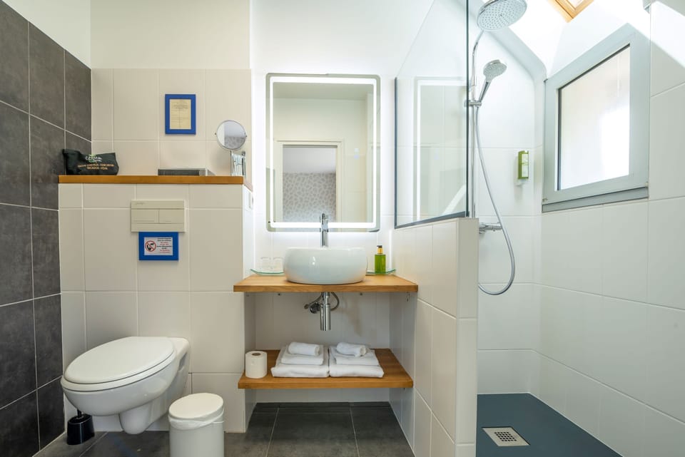 Shower, hair dryer, bathrobes, towels