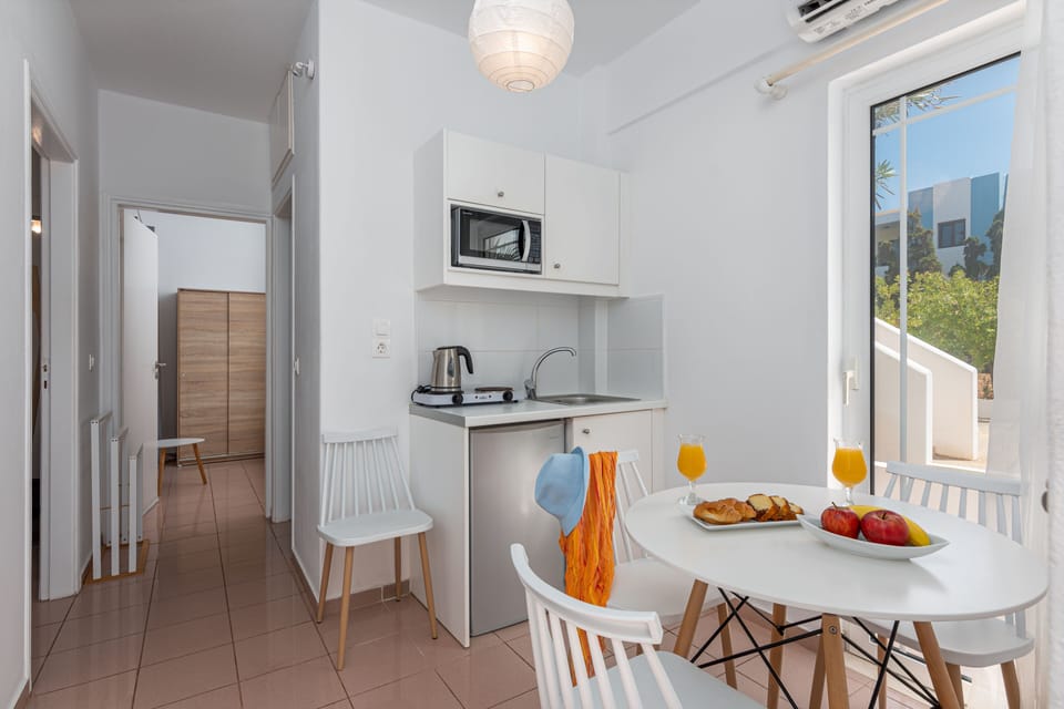 Mini-fridge, stovetop, coffee/tea maker, electric kettle