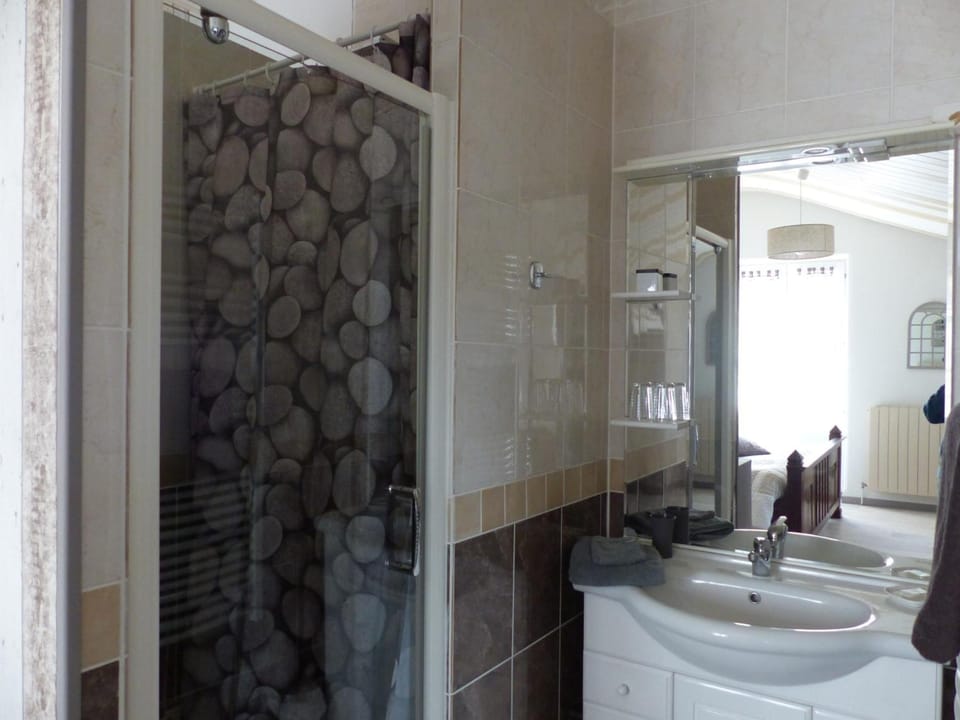 Shower, eco-friendly toiletries, hair dryer, towels