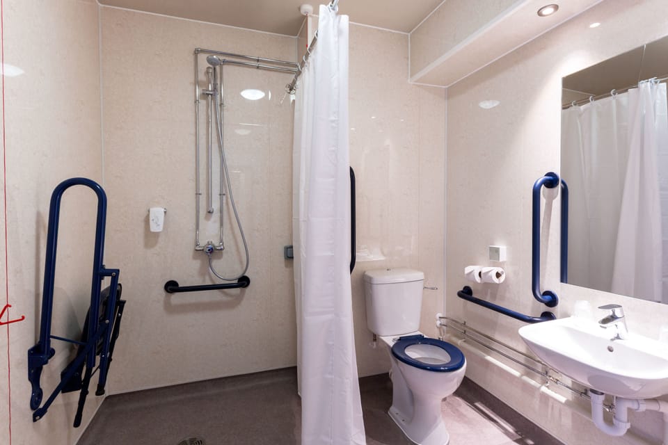 Double or Twin Room, Accessible | Bathroom | Shower, free toiletries, hair dryer, towels