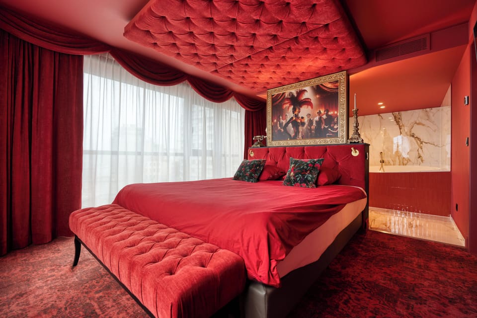 Romantic Suite, 1 Bedroom | Minibar, blackout drapes, soundproofing, free WiFi