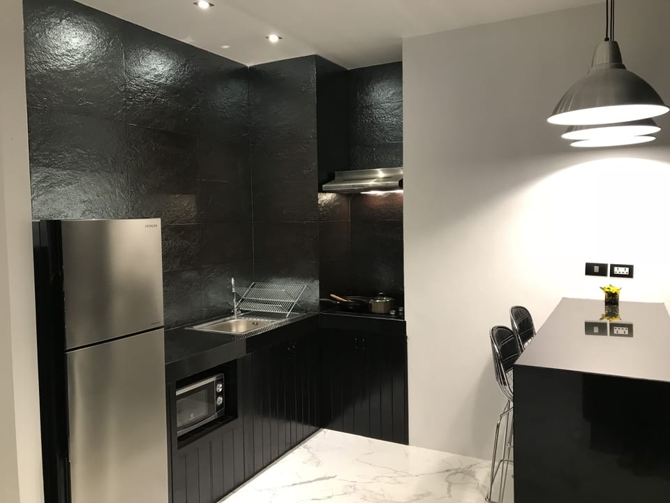 One Bedroom Villa | Private kitchen | Full-size fridge, microwave, stovetop, electric kettle