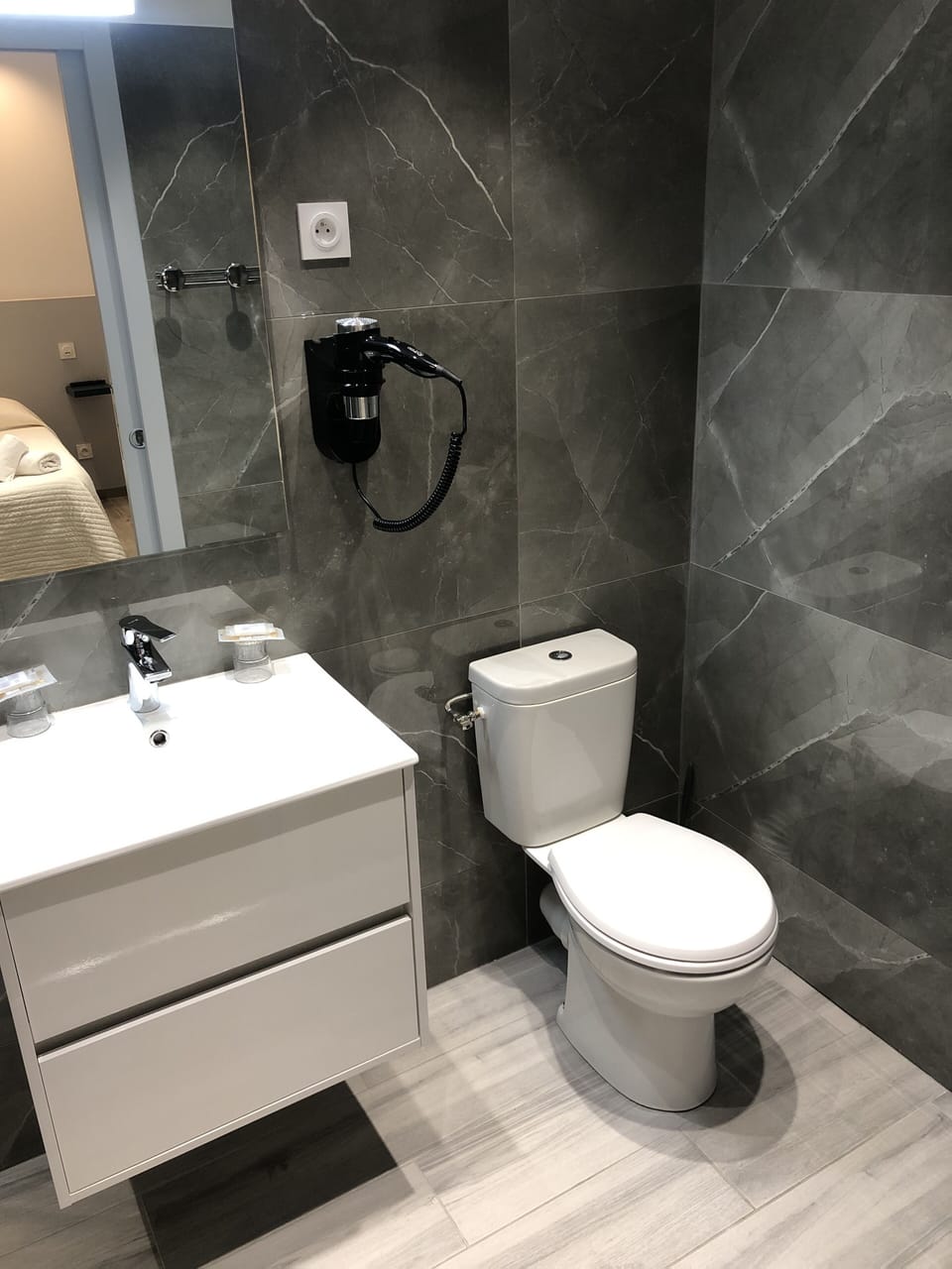 Shower, free toiletries, hair dryer, towels