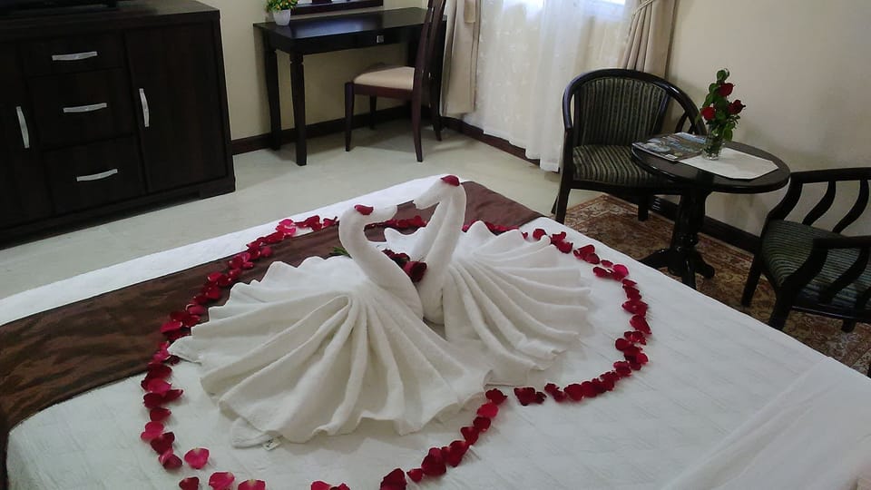Superior Suite, 1 Bedroom, Refrigerator, Pool View | 1 bedroom, premium bedding, individually decorated