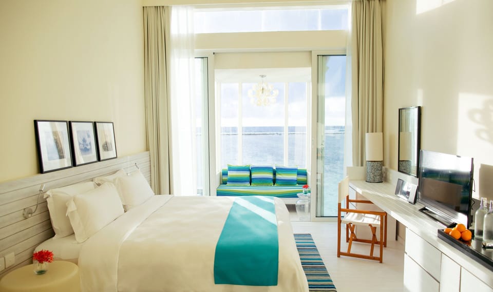 Villa, 2 Bedrooms, Sea View, Overwater | Premium bedding, down comforters, memory foam beds, minibar