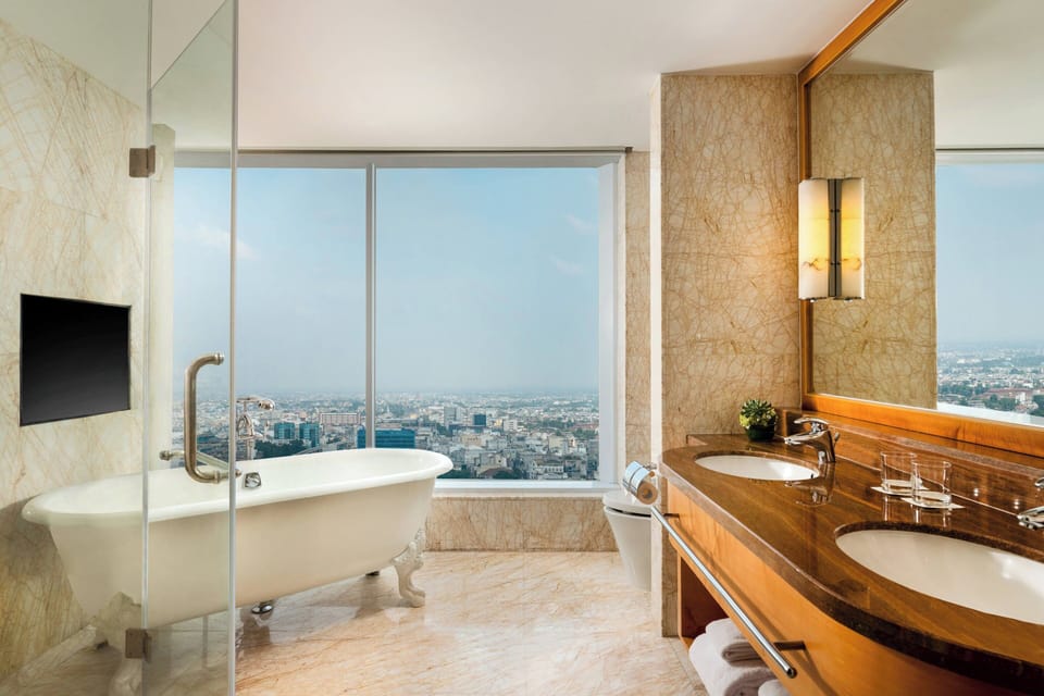 Ambassador Suite | Bathroom | Separate tub and shower, rainfall showerhead, free toiletries