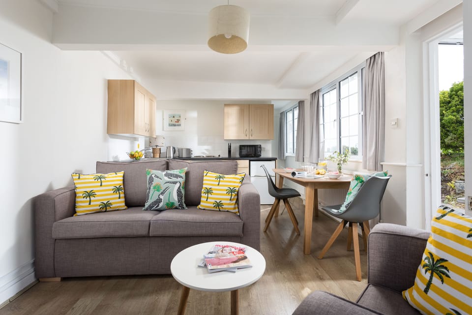 Apartment, 1 Bedroom | Living area | Flat-screen TV