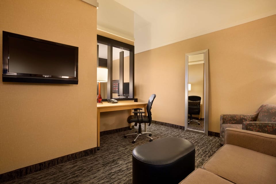 Junior Suite, 1 King Bed, Non Smoking | Premium bedding, desk, iron/ironing board, free cribs/infant beds