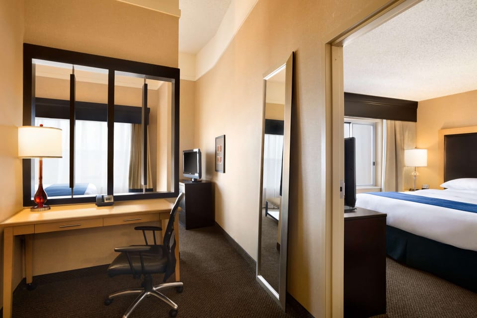 Suite, Multiple Beds, Non Smoking | Premium bedding, desk, iron/ironing board, free cribs/infant beds