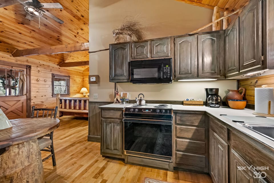 Luxury Cabin, 1 King Bed, Jetted Tub, Hill View (The Cherokee) | Private kitchen | Fridge, microwave, oven, stovetop