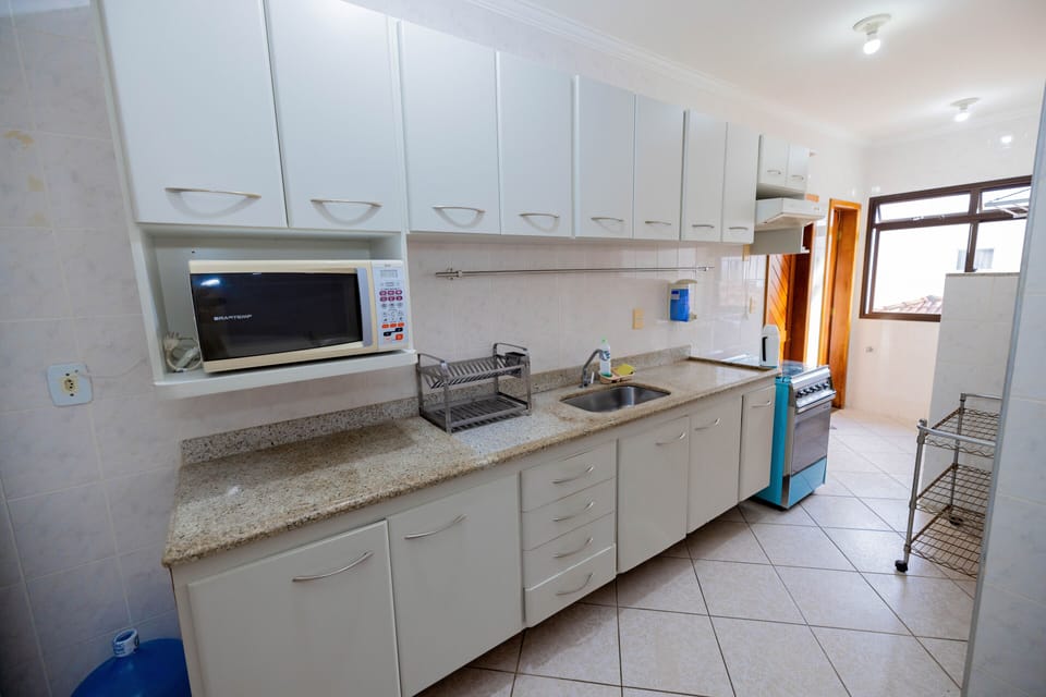 Family Apartment | Private kitchen | Fridge, microwave, oven, coffee/tea maker