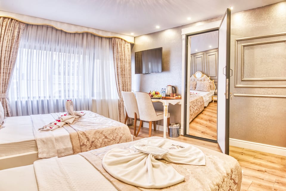 Family Room | 1 bedroom, Egyptian cotton sheets, premium bedding, minibar