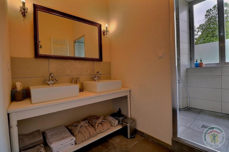 Separate tub and shower, free toiletries, hair dryer, bathrobes