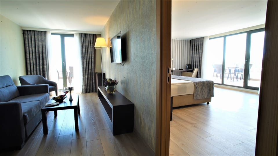 Corner Suit Room With Terrace | Premium bedding, in-room safe, desk, soundproofing