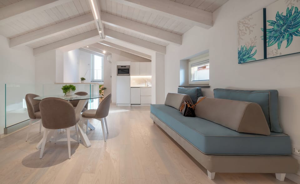 Apartment, Private Bathroom, City View | Living area | Flat-screen TV