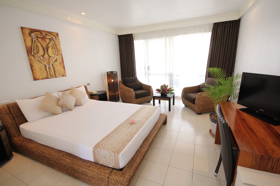 Superior Orchid Room | Premium bedding, in-room safe, desk, blackout drapes