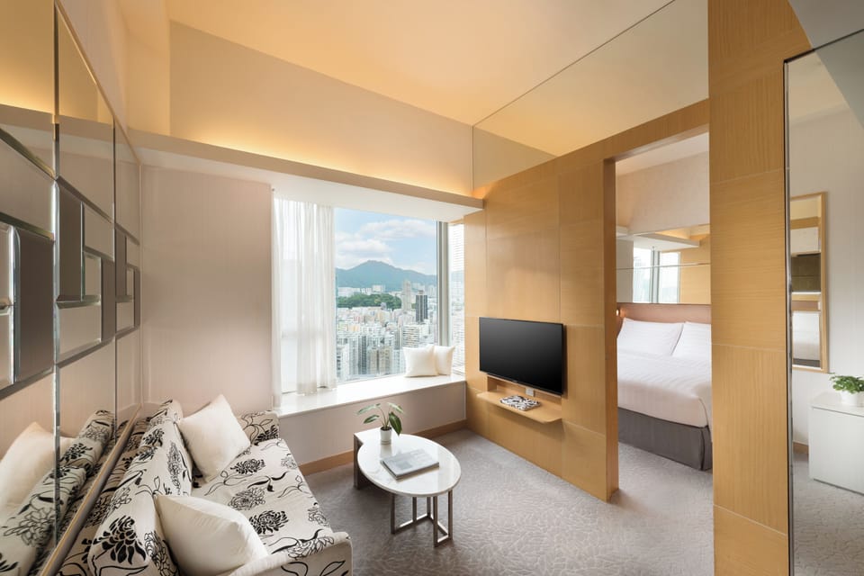 Suite Premier | Living area | 26-inch LCD TV with cable channels, TV