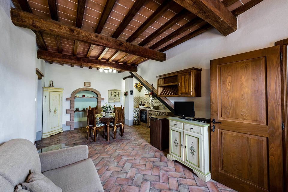Superior Apartment, 1 Bedroom | Living area | TV, fireplace