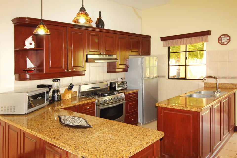 Deluxe House, Multiple Bedrooms, Non Smoking, Pool View | Private kitchen | Coffee/tea maker, fridge, microwave, stovetop