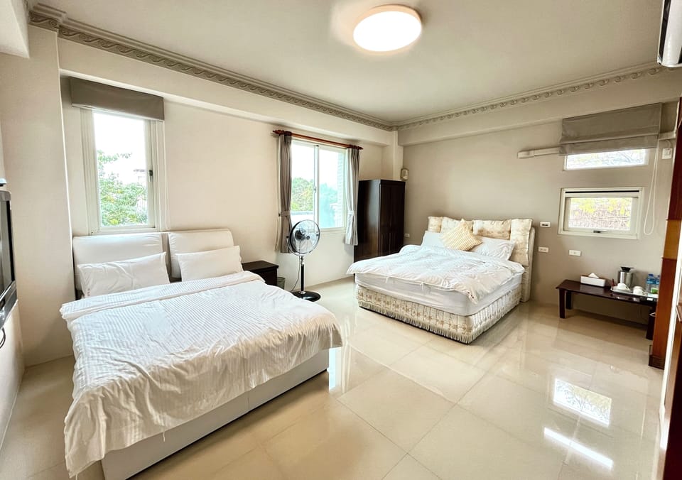 Family Quadruple Room(Accept extra 1 person, charge TWD500 at front desk) | Desk, blackout drapes, soundproofing, free WiFi