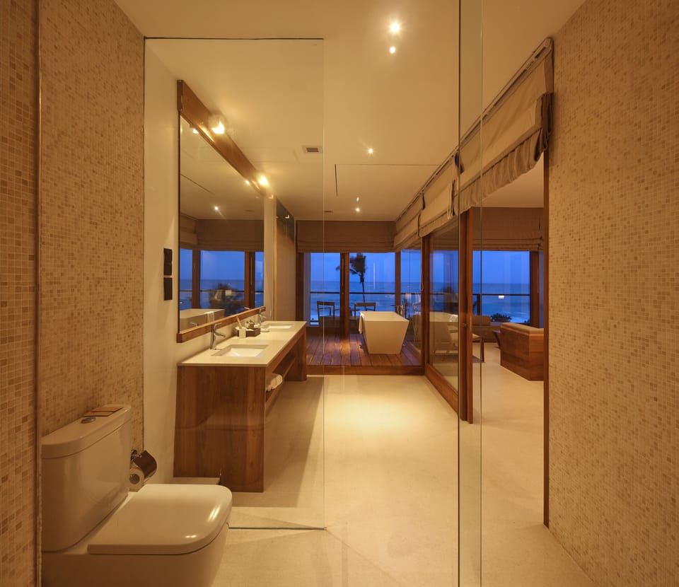 Design Suite, Balcony, Ocean View | Bathroom | Rainfall showerhead, free toiletries, hair dryer, bathrobes