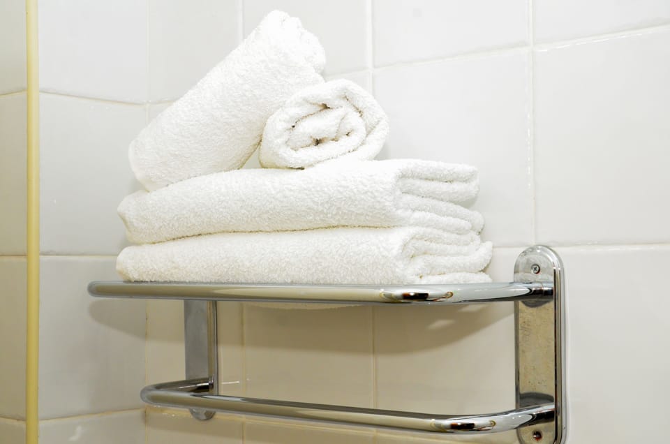 Shower, free toiletries, hair dryer, slippers
