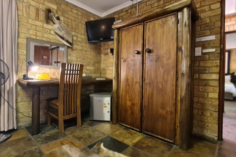 Standard Double Room, Ensuite, Ground Floor | 1 bedroom, in-room safe, cribs (free), WiFi (free)