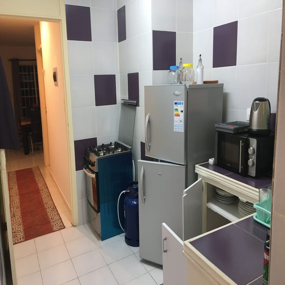 Comfort Apartment, 1 Bedroom, Non Smoking | Private kitchen | Coffee/tea maker, full-size fridge, microwave, oven