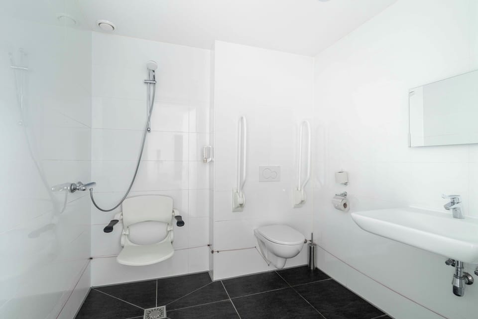 Family Quadruple Room, Accessible | Bathroom | Shower, eco-friendly toiletries, hair dryer, towels