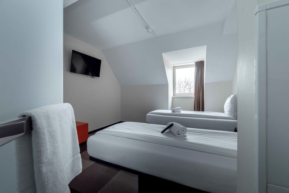 Standard Twin Room | Memory foam beds, laptop workspace, soundproofing, iron/ironing board