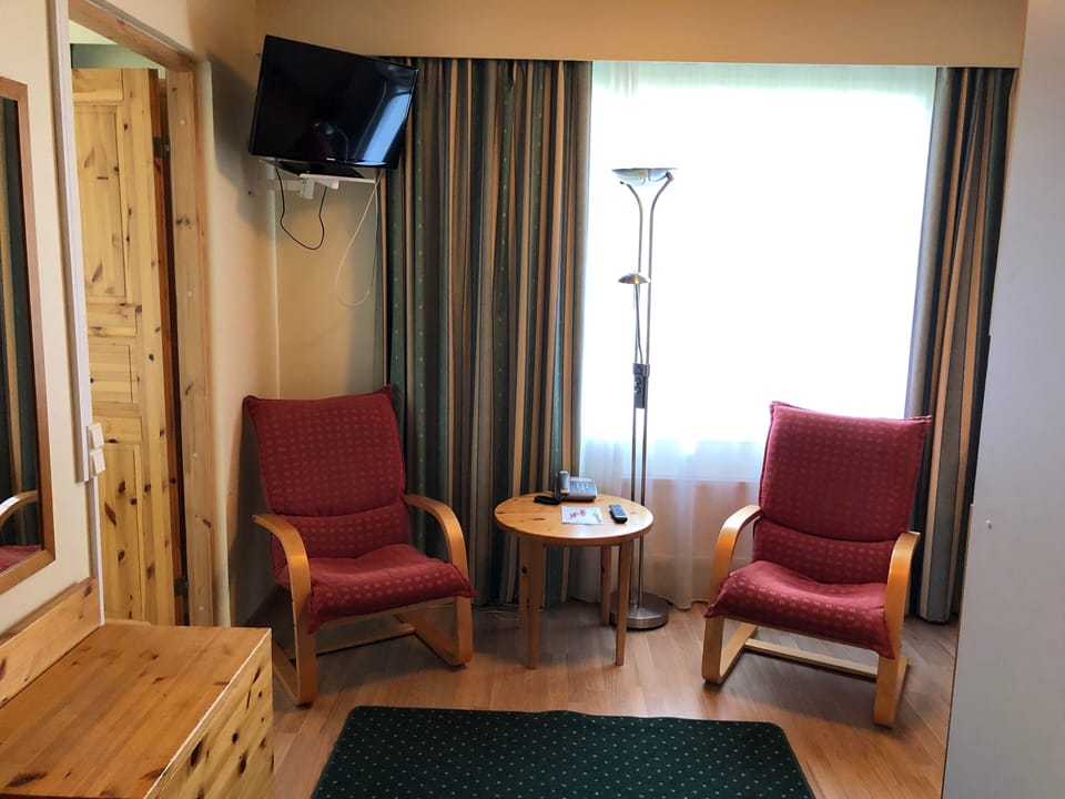 Studios with Sauna | Living area | TV