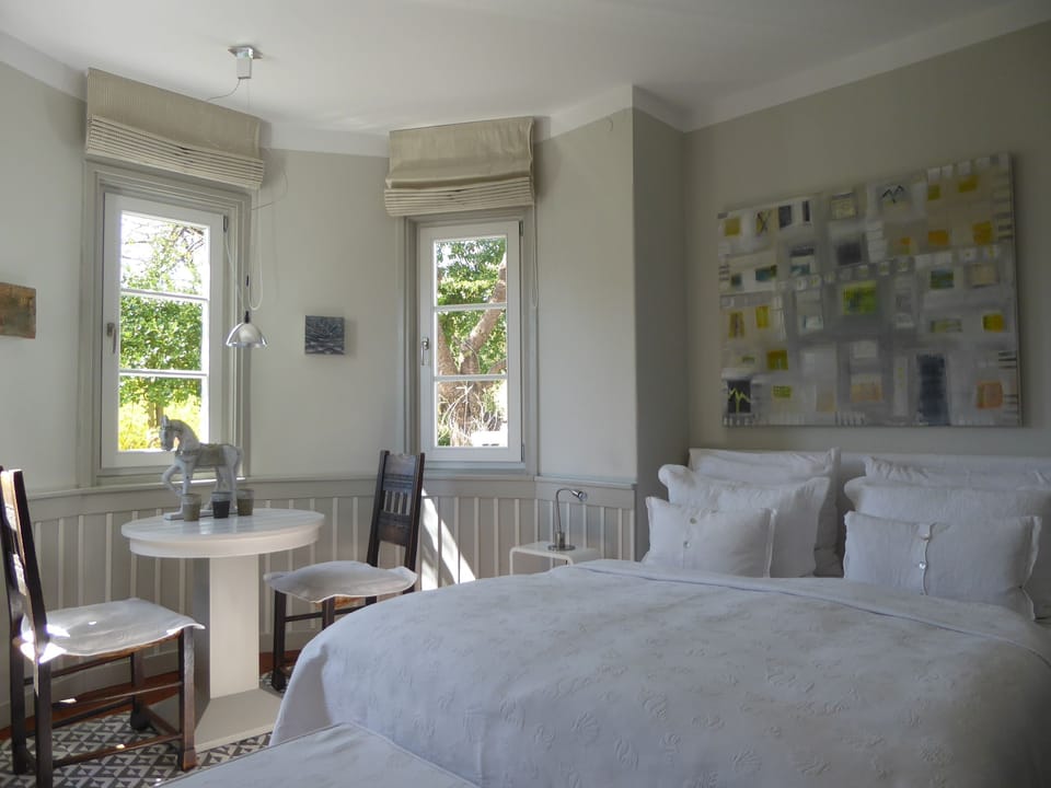 Economy Double Room (private seperate bathroom) | Premium bedding, down comforters, soundproofing, rollaway beds