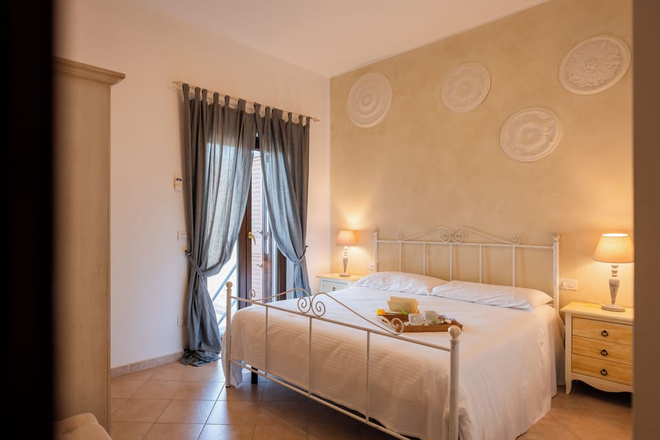 Luxury Suite, 2 Bedrooms, Patio | Individually decorated, desk, blackout drapes, soundproofing