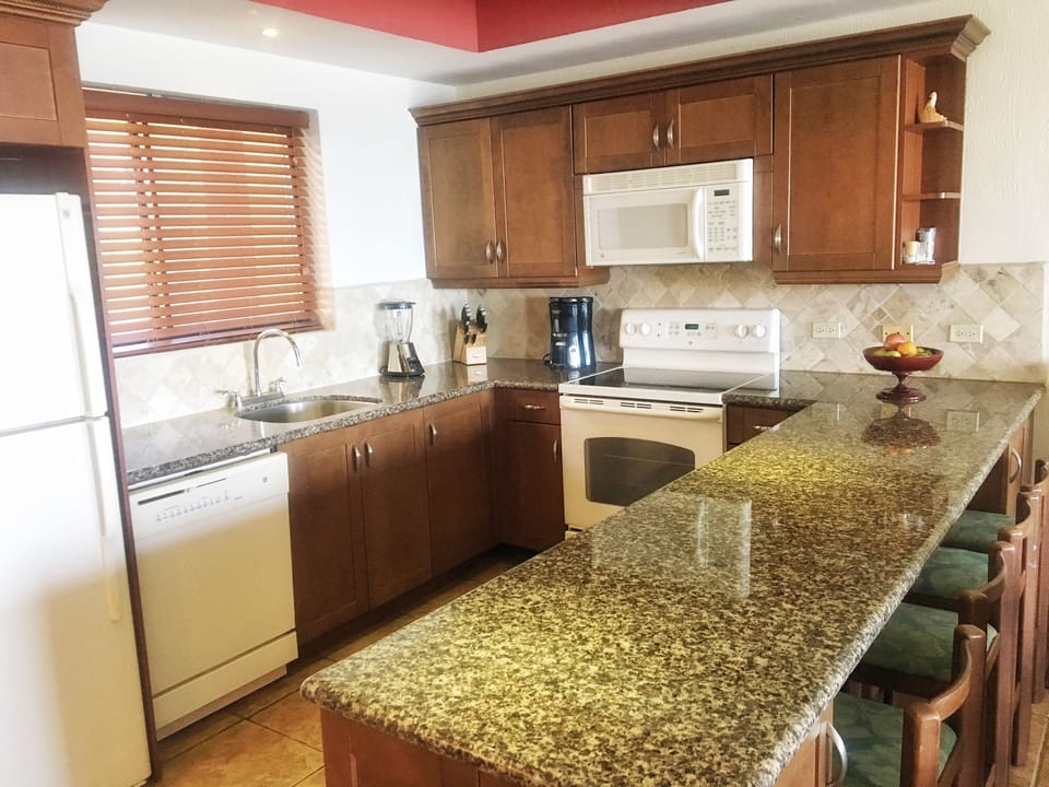 Premium Suite, Multiple Beds, Non Smoking, Ocean View | Private kitchen | Coffee/tea maker, full-size fridge, microwave, oven