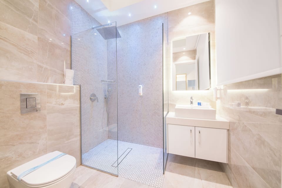 Mystiko Two Bedroom Deluxe Suite,Sea View & Plounge Pool | Bathroom | Shower, free toiletries, hair dryer, slippers