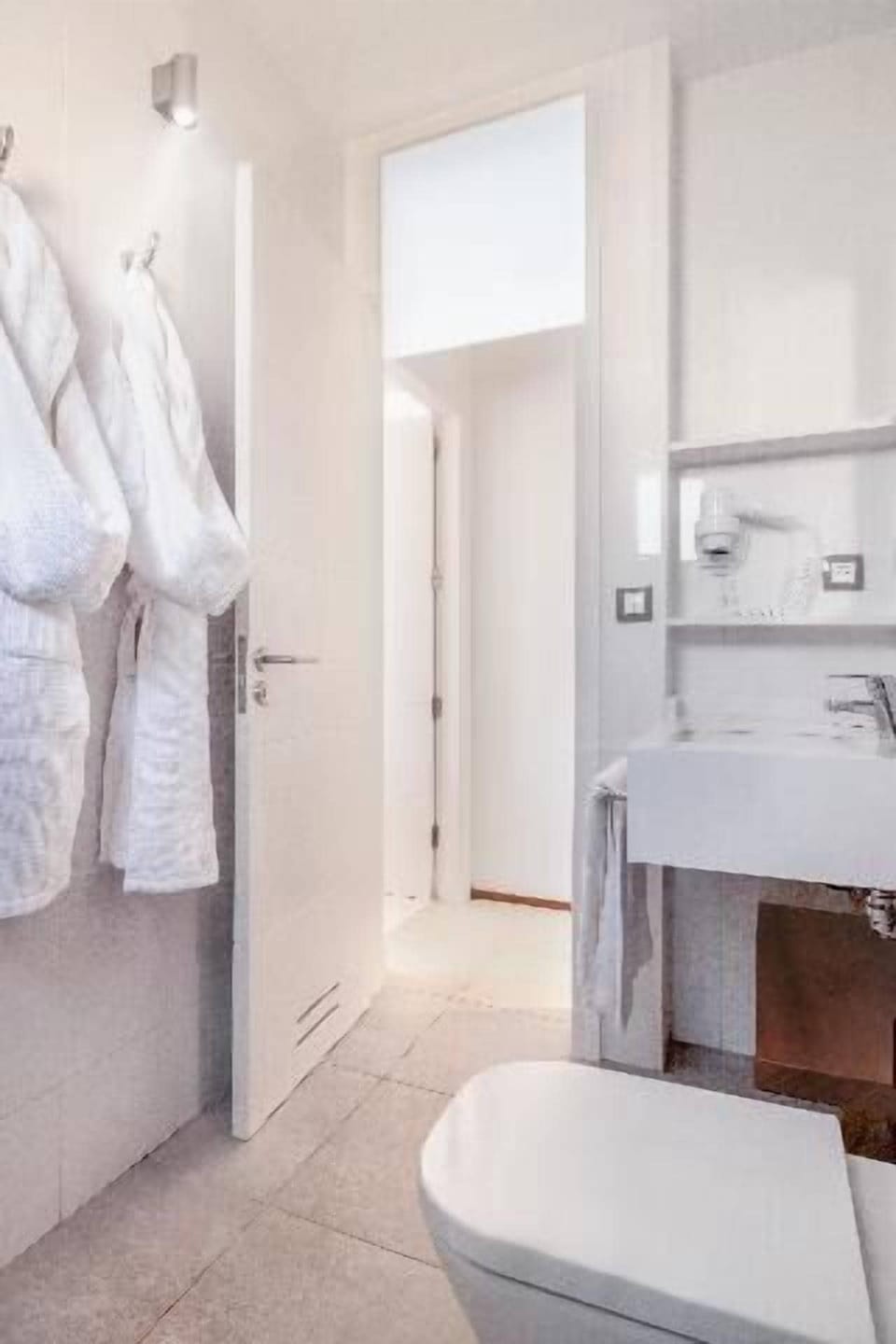 Shower, bathrobes, towels