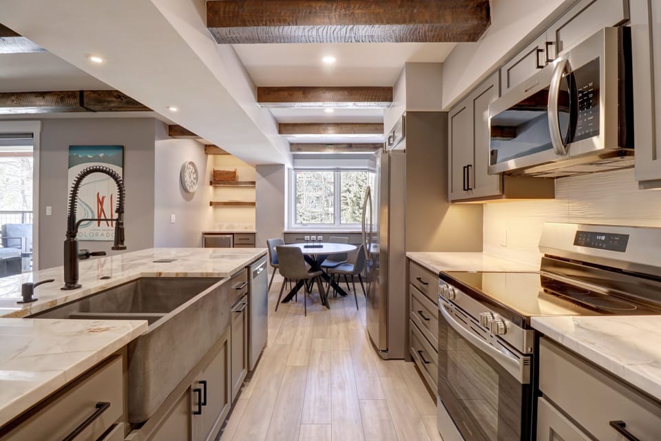 Condo, 2 Bedrooms | Private kitchen | Fridge, microwave, oven, dishwasher